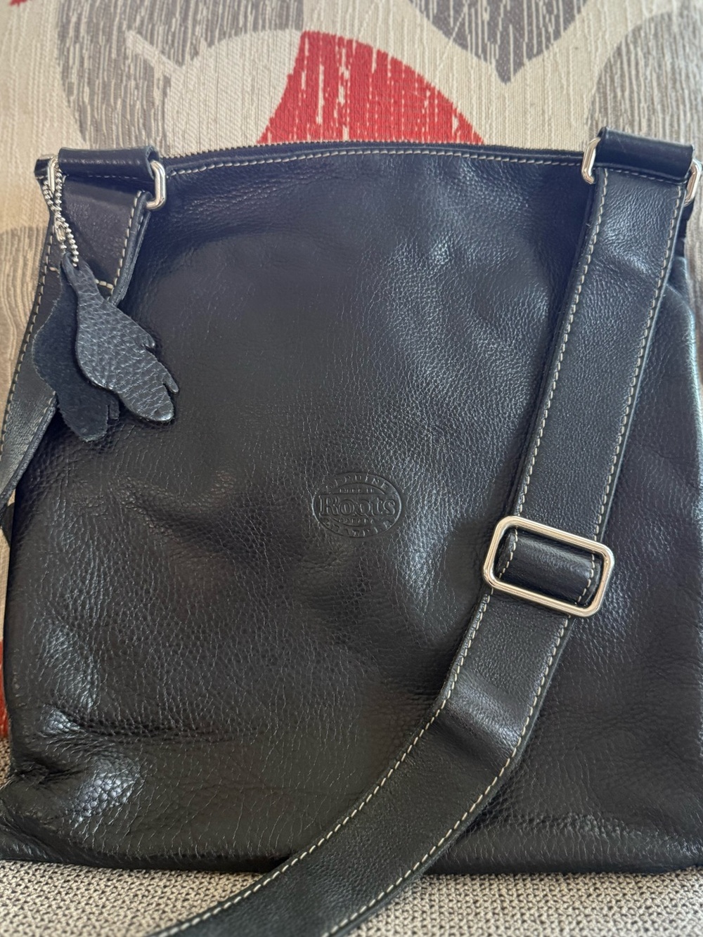 Roots Venetian Village Crossbody 
Leather Bag